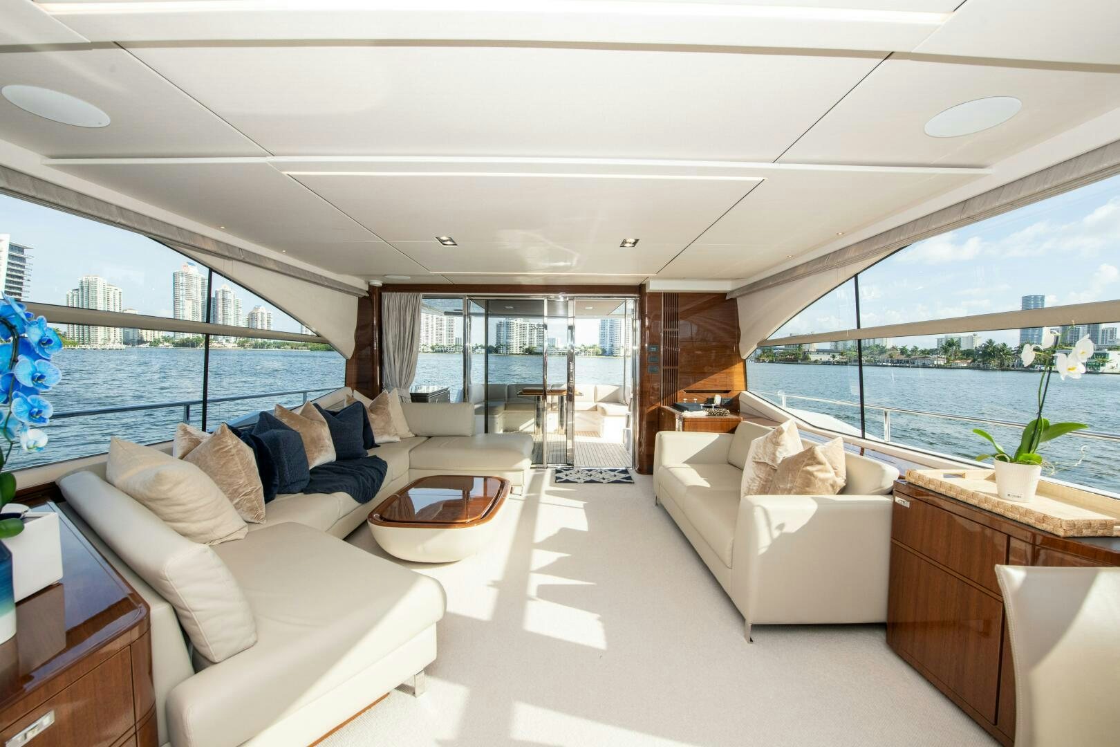 a living room with a large window aboard OUR ALEPH Yacht for Sale