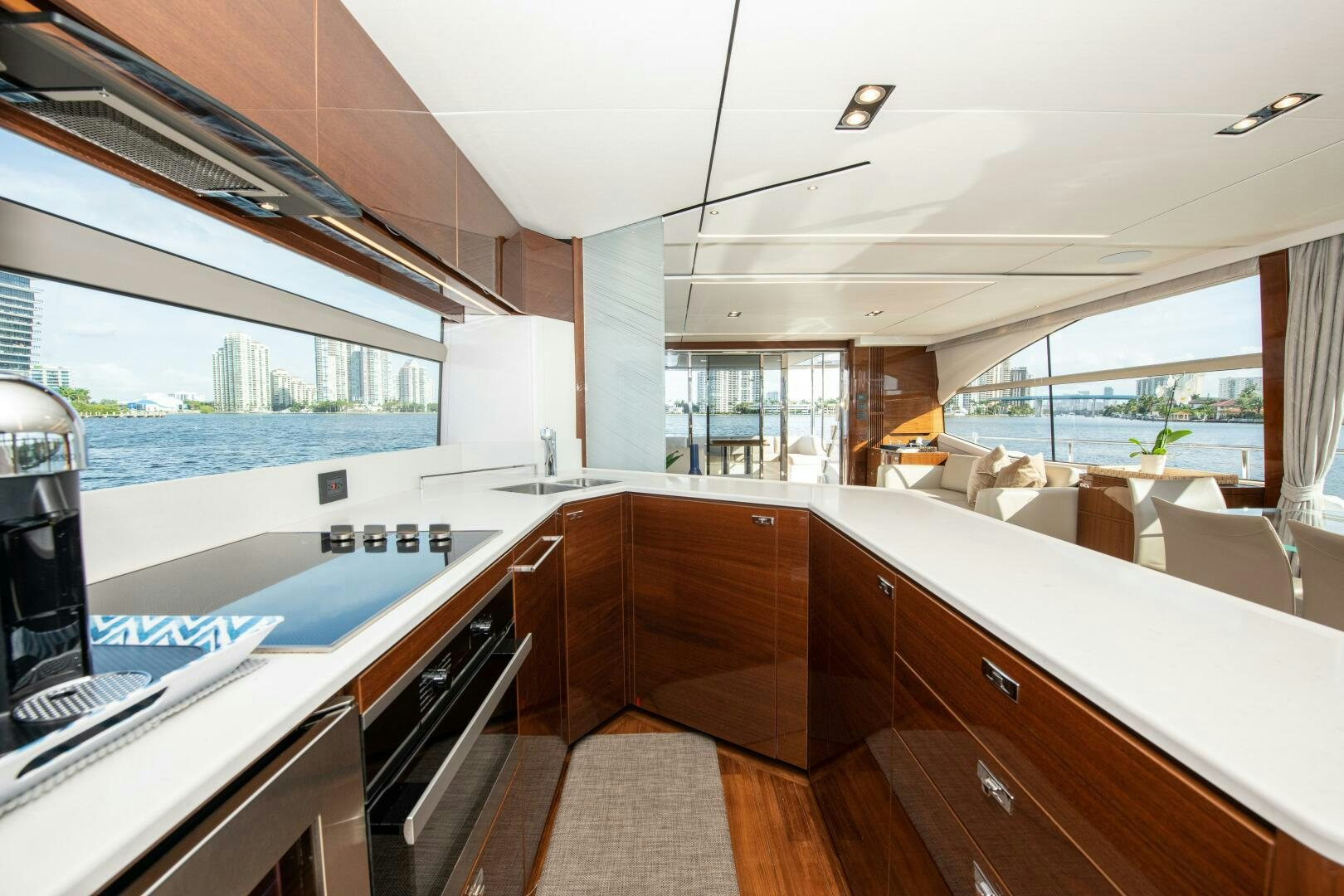 a kitchen with a large window aboard OUR ALEPH Yacht for Sale
