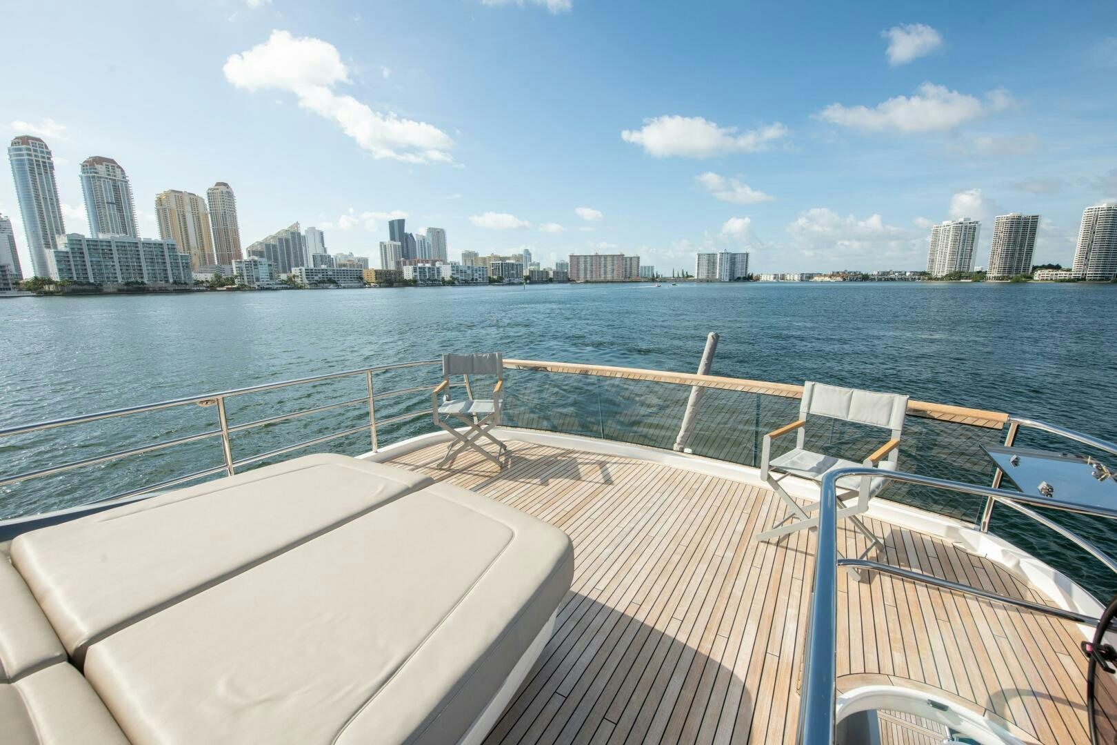 a deck overlooking a city aboard OUR ALEPH Yacht for Sale