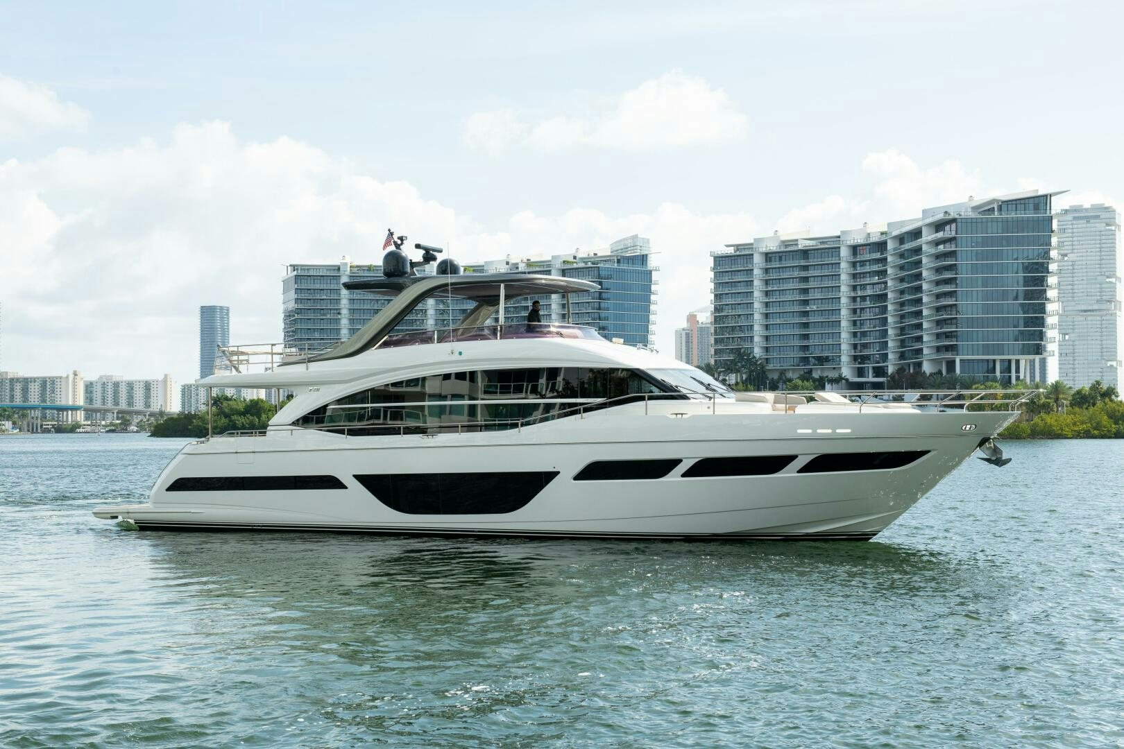 a white yacht in the water aboard OUR ALEPH Yacht for Sale