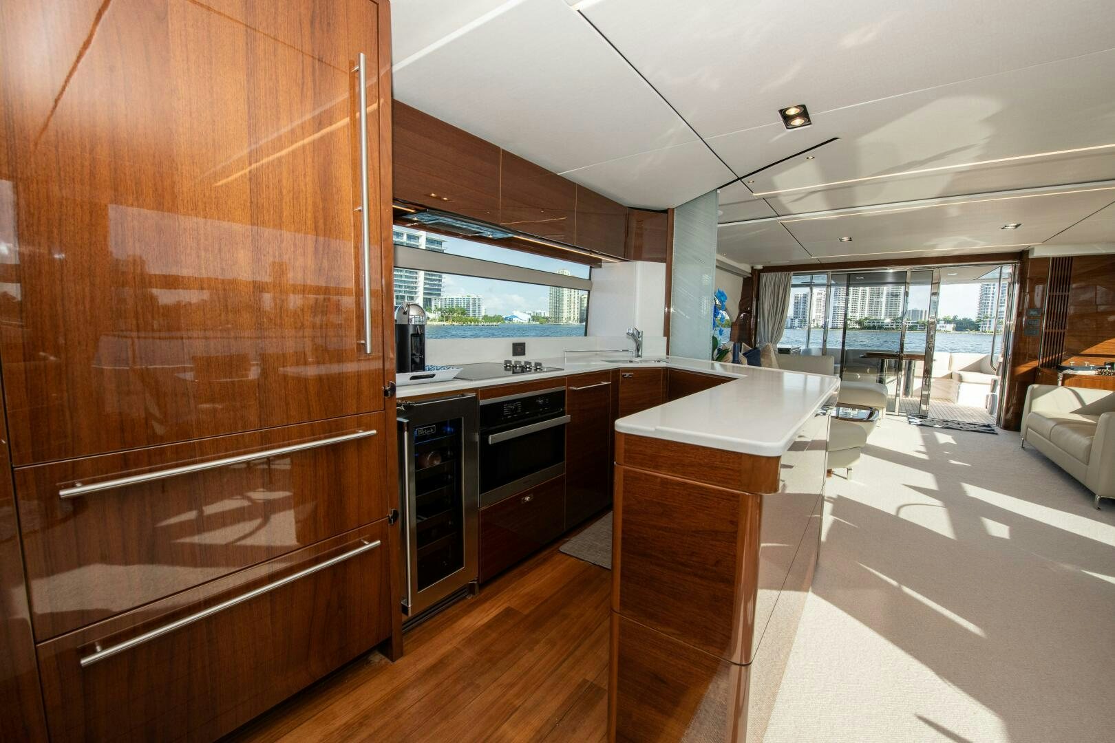 a kitchen with a large wooden cabinet aboard OUR ALEPH Yacht for Sale