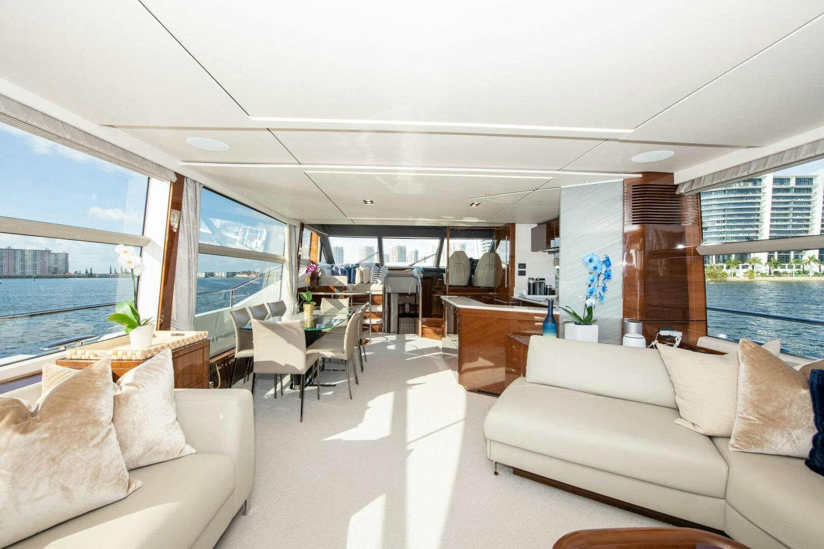 a living room with a large window aboard OUR ALEPH Yacht for Sale