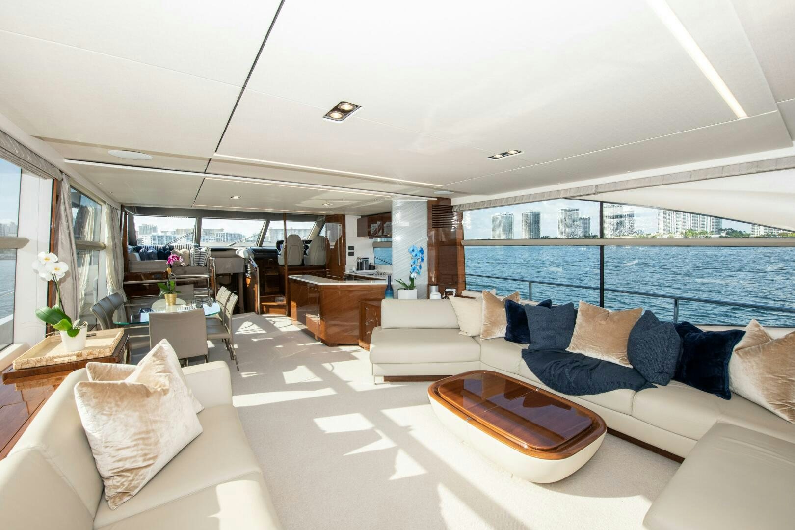 a living room with a large window aboard OUR ALEPH Yacht for Sale