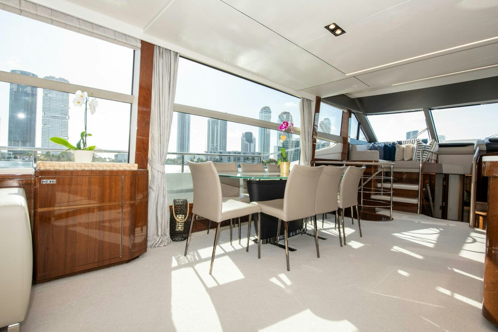 a room with a table chairs and a window aboard OUR ALEPH Yacht for Sale
