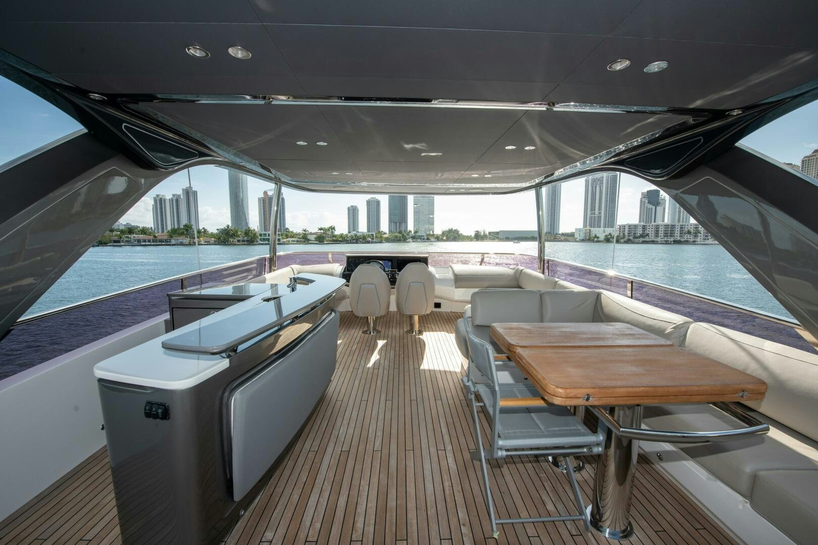 a boat with a deck and chairs aboard OUR ALEPH Yacht for Sale