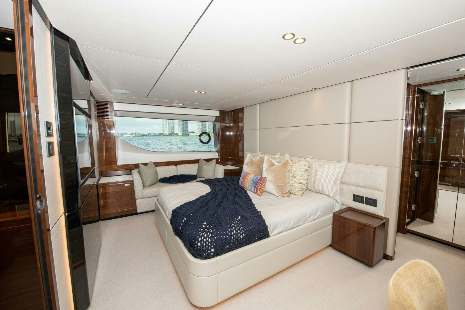 a bedroom with a large bed aboard OUR ALEPH Yacht for Sale