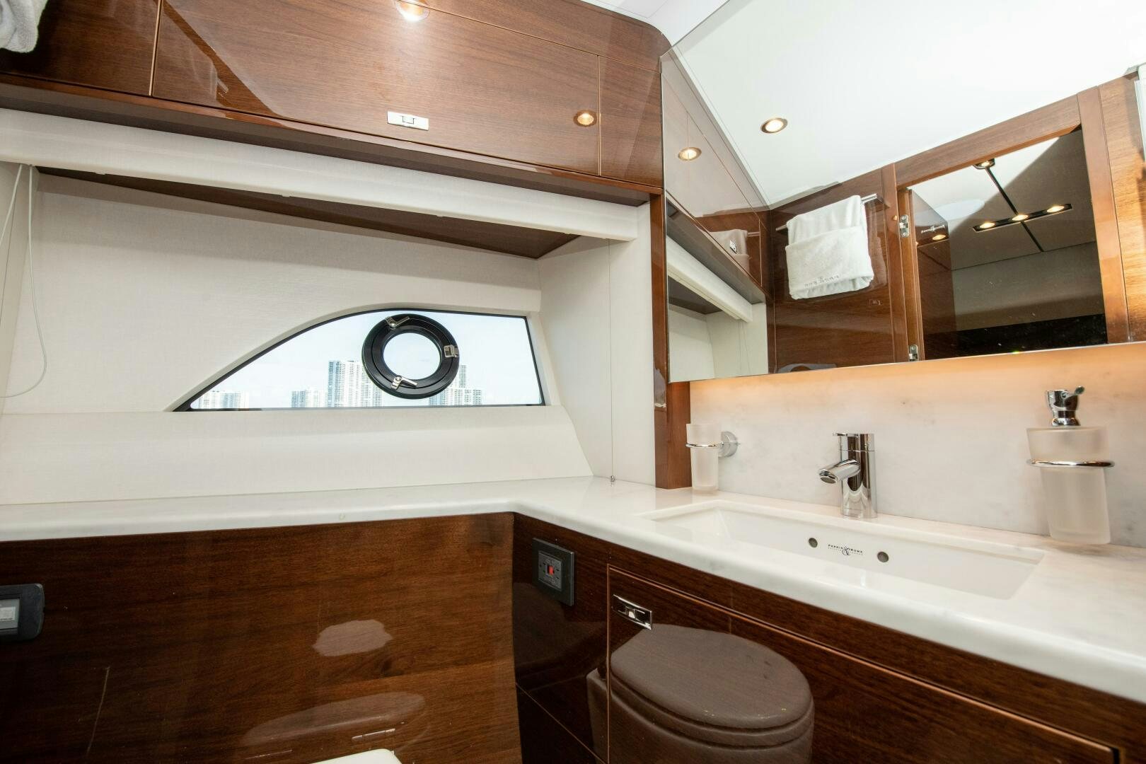 a bathroom with a toilet and a sink aboard OUR ALEPH Yacht for Sale