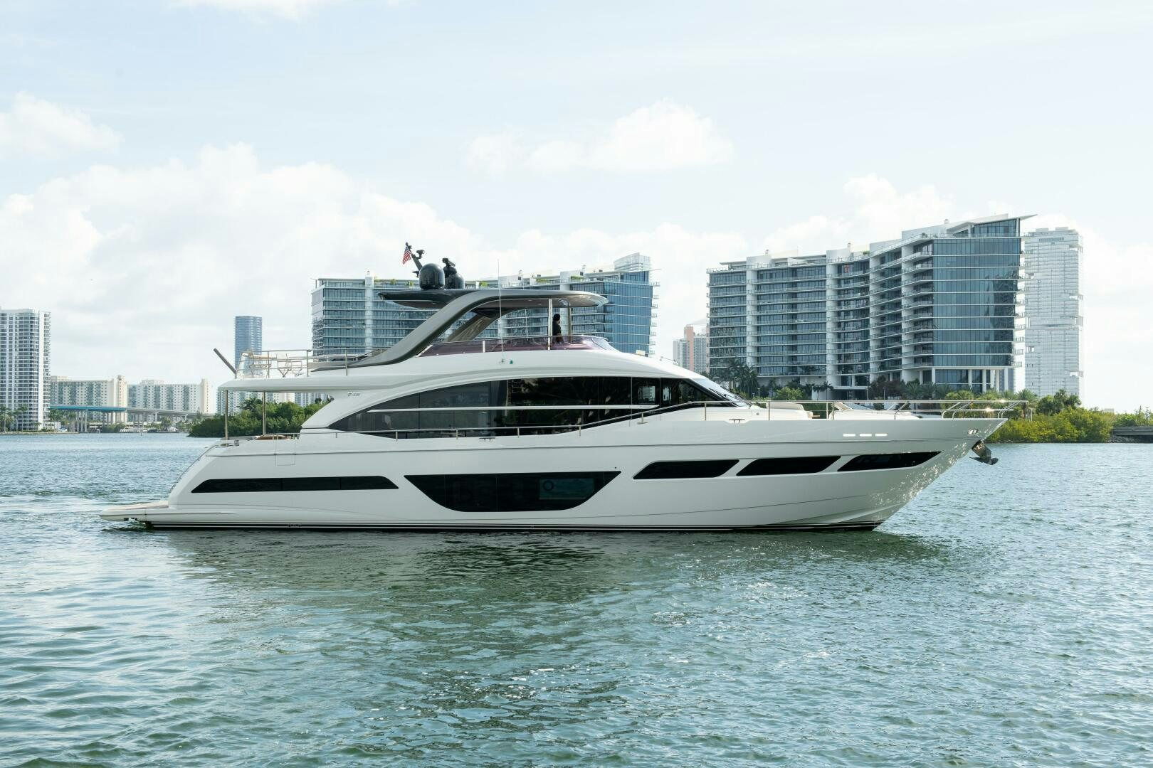 a white yacht in the water aboard OUR ALEPH Yacht for Sale