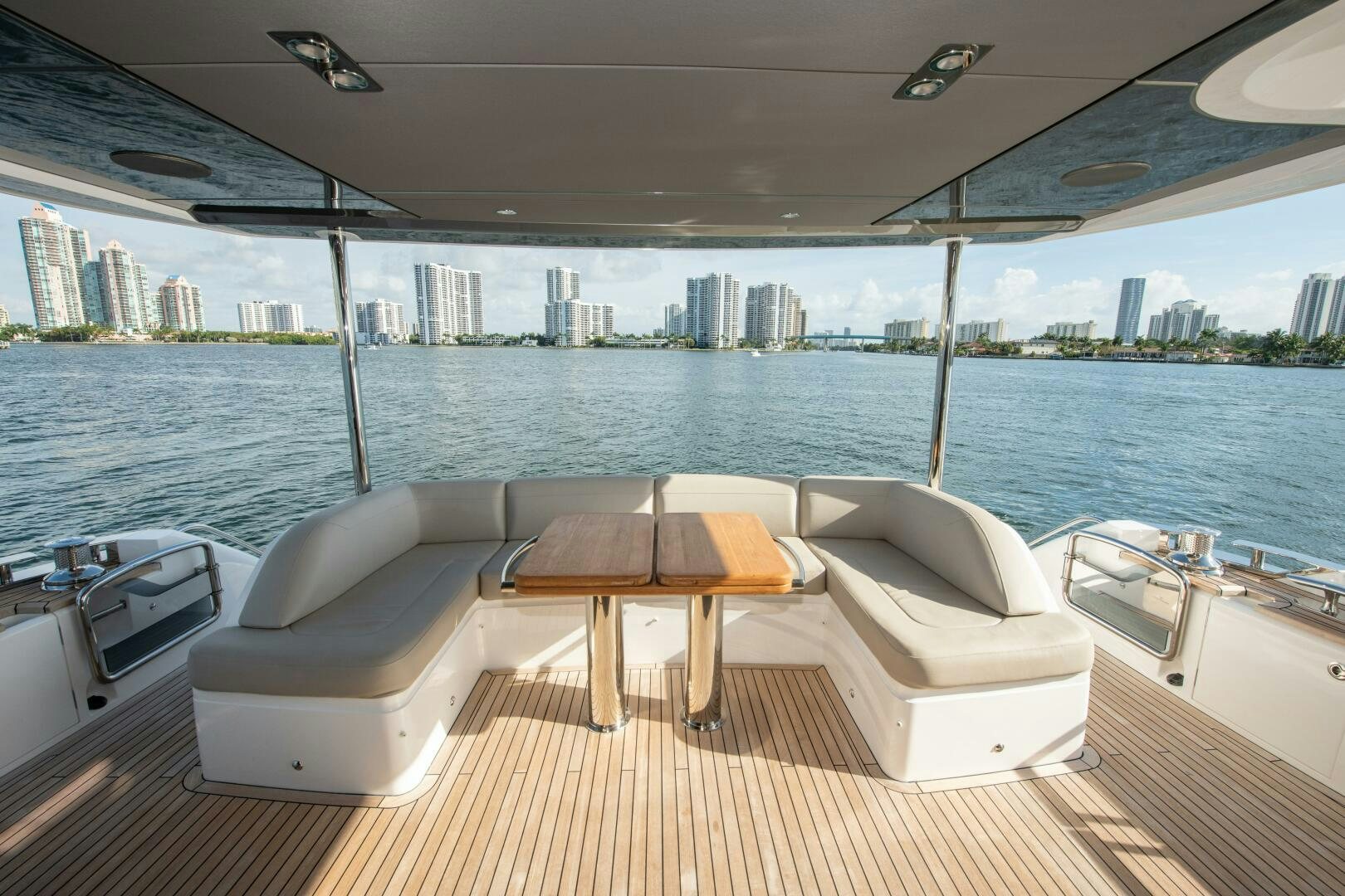 a room with a view of a city and a body of water aboard OUR ALEPH Yacht for Sale