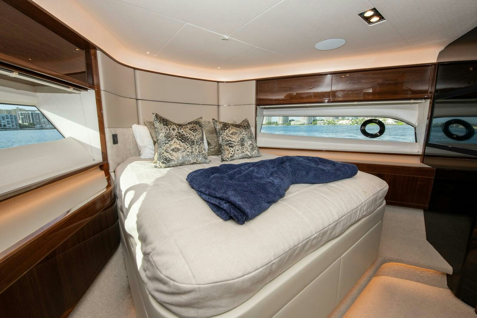 a room with a bed and a window aboard OUR ALEPH Yacht for Sale