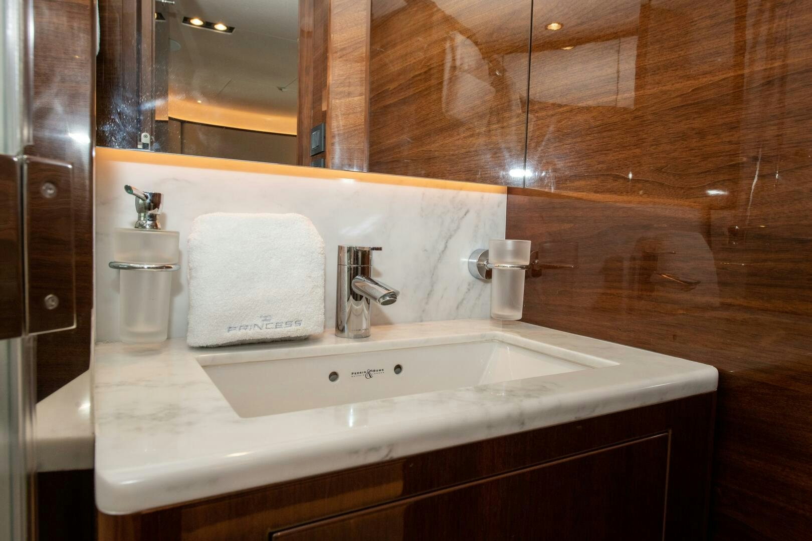 a bathroom with a sink and a mirror aboard OUR ALEPH Yacht for Sale