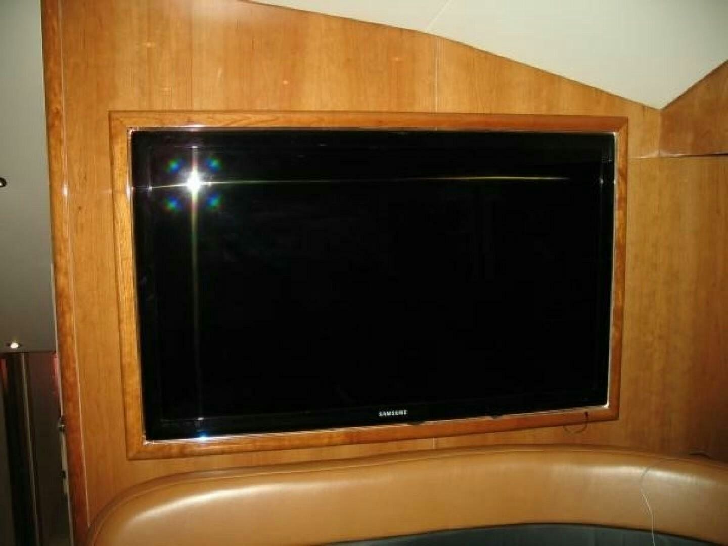 a tv on a wall aboard LIVNWEL Yacht for Sale