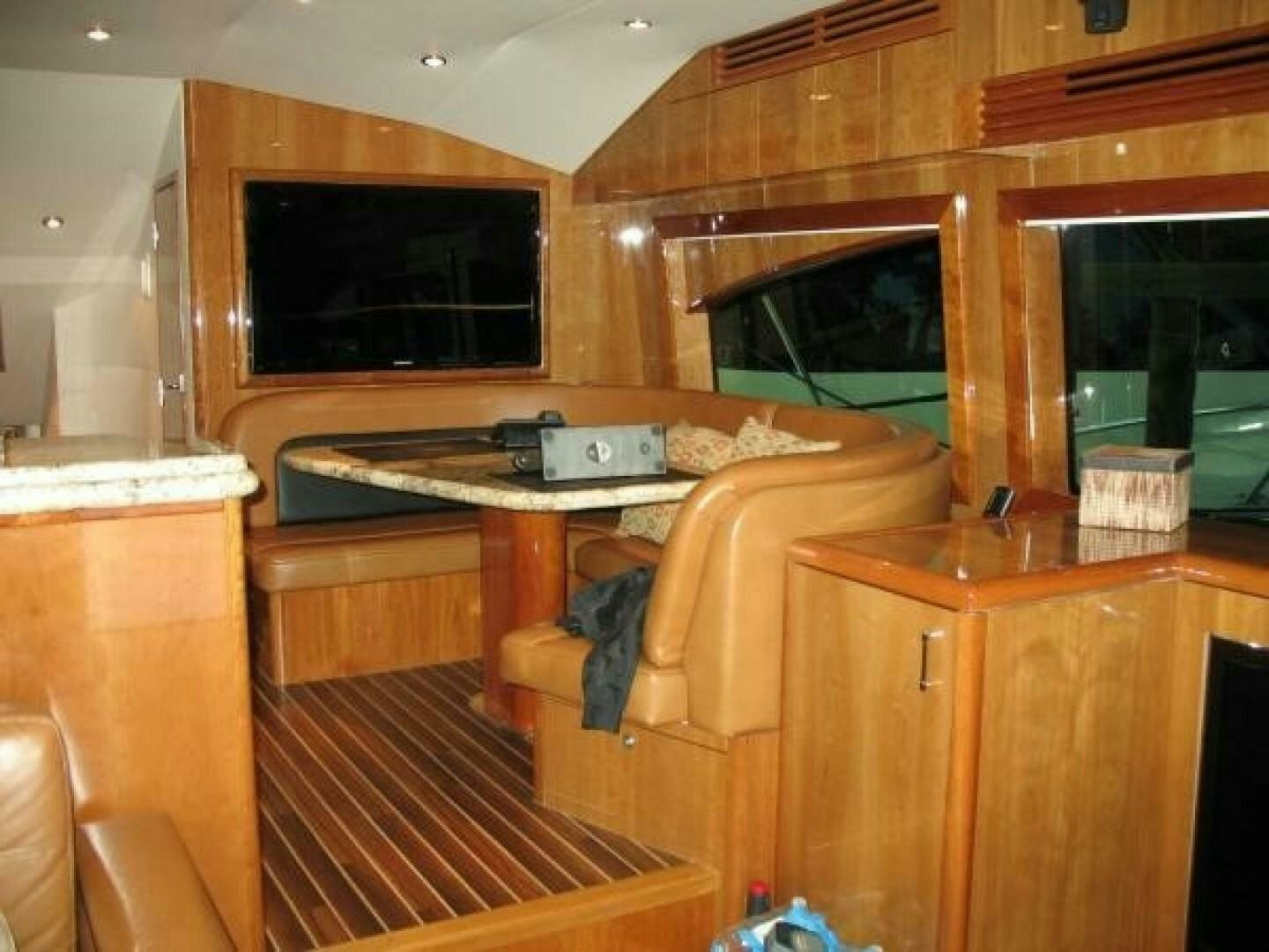 a cabin with a desk and tv aboard LIVNWEL Yacht for Sale