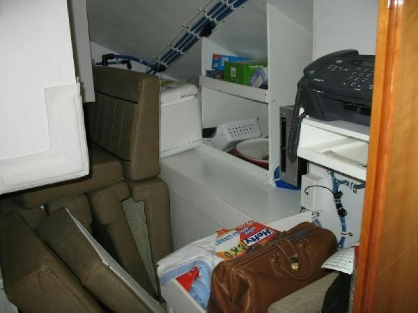 a room with shelves and a shoe aboard LIVNWEL Yacht for Sale