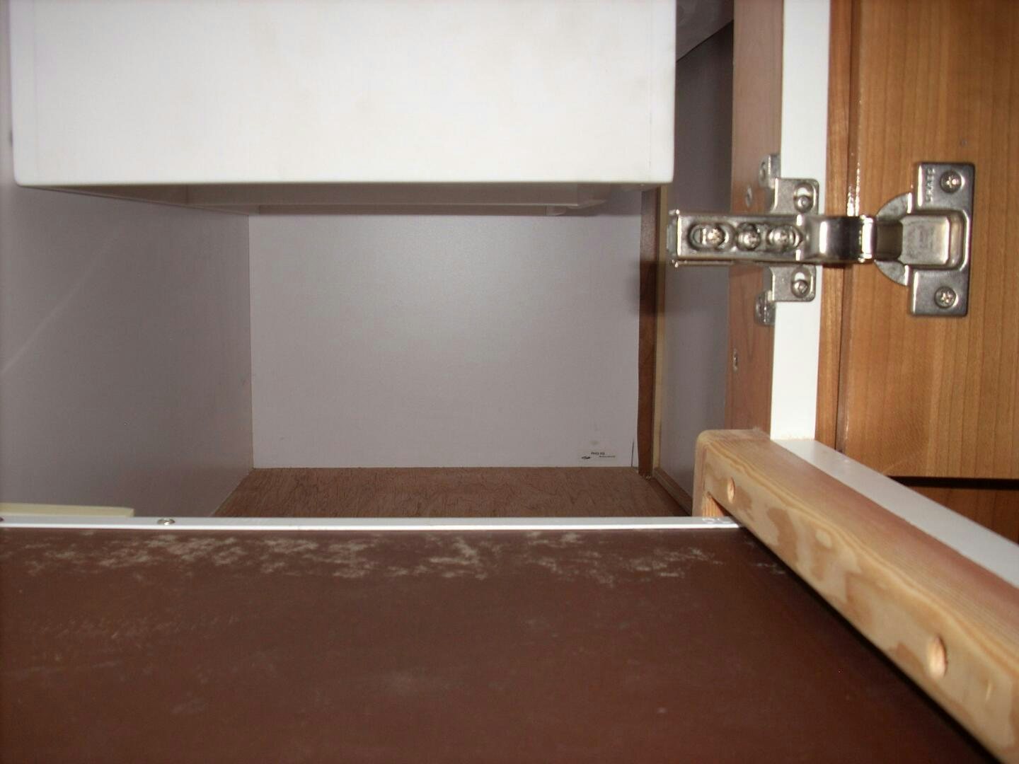 a door with a handle aboard LIVNWEL Yacht for Sale