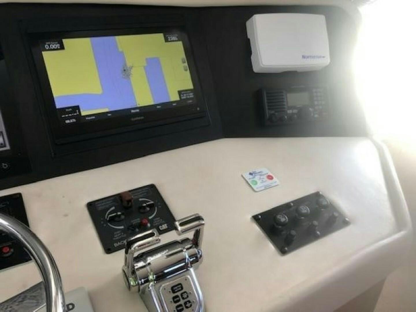 a computer with a green screen aboard LIVNWEL Yacht for Sale