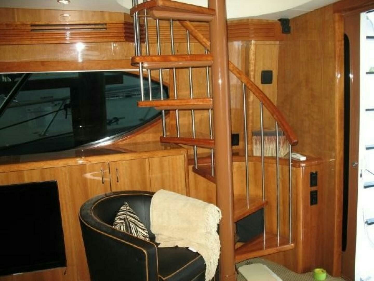 a wooden bunk bed in a room aboard LIVNWEL Yacht for Sale