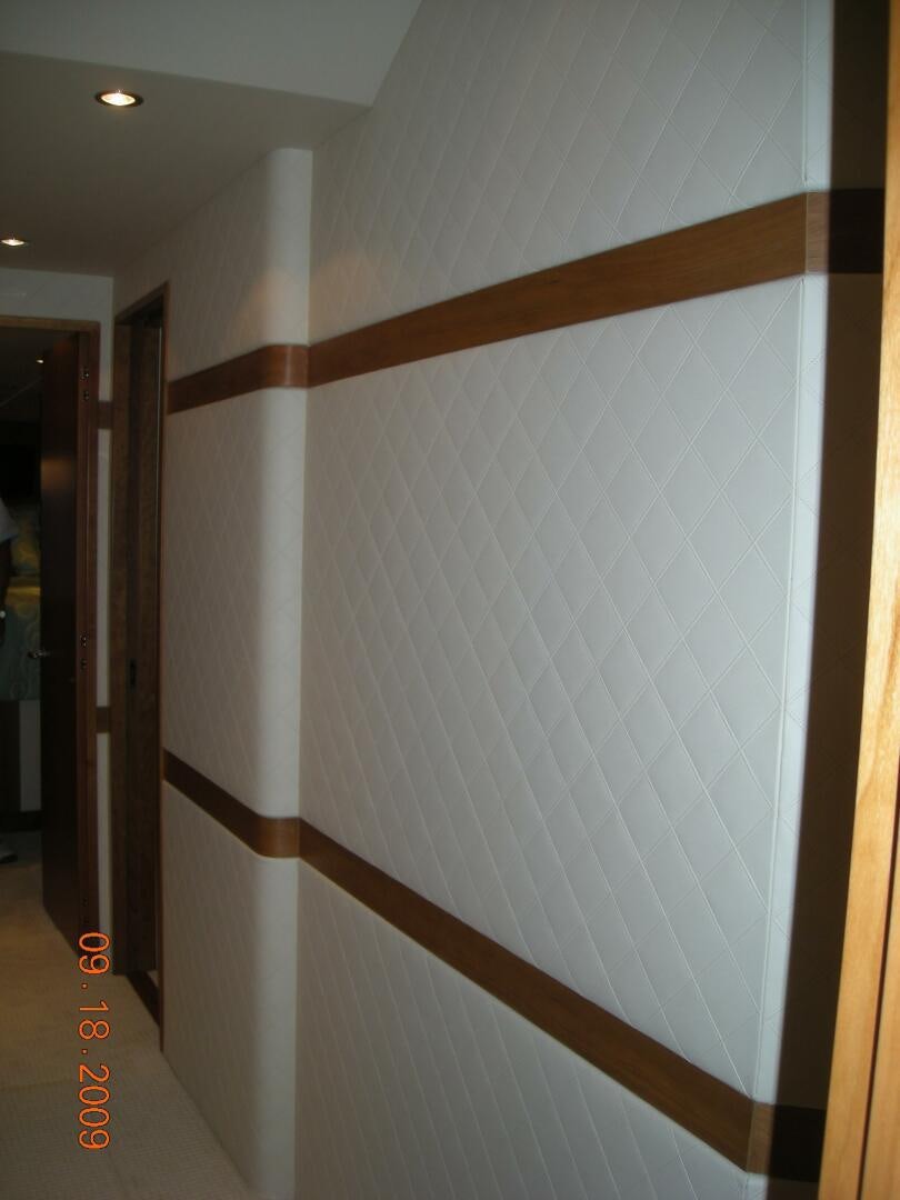 a wall with a white tiled wall aboard LIVNWEL Yacht for Sale