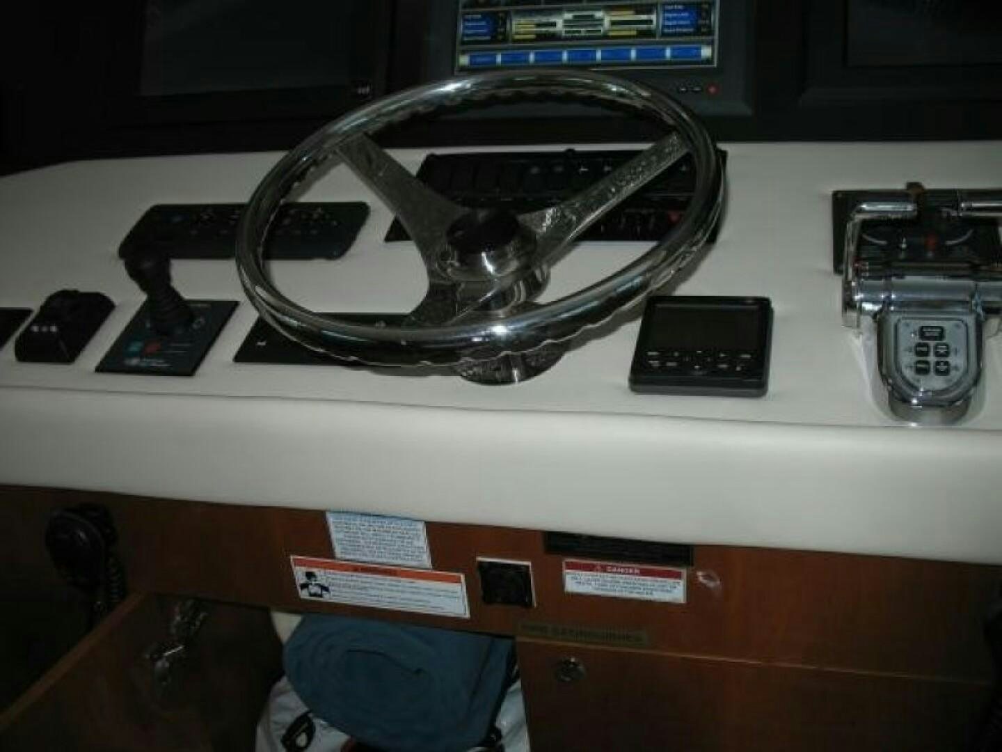 a white machine with a silver face aboard LIVNWEL Yacht for Sale