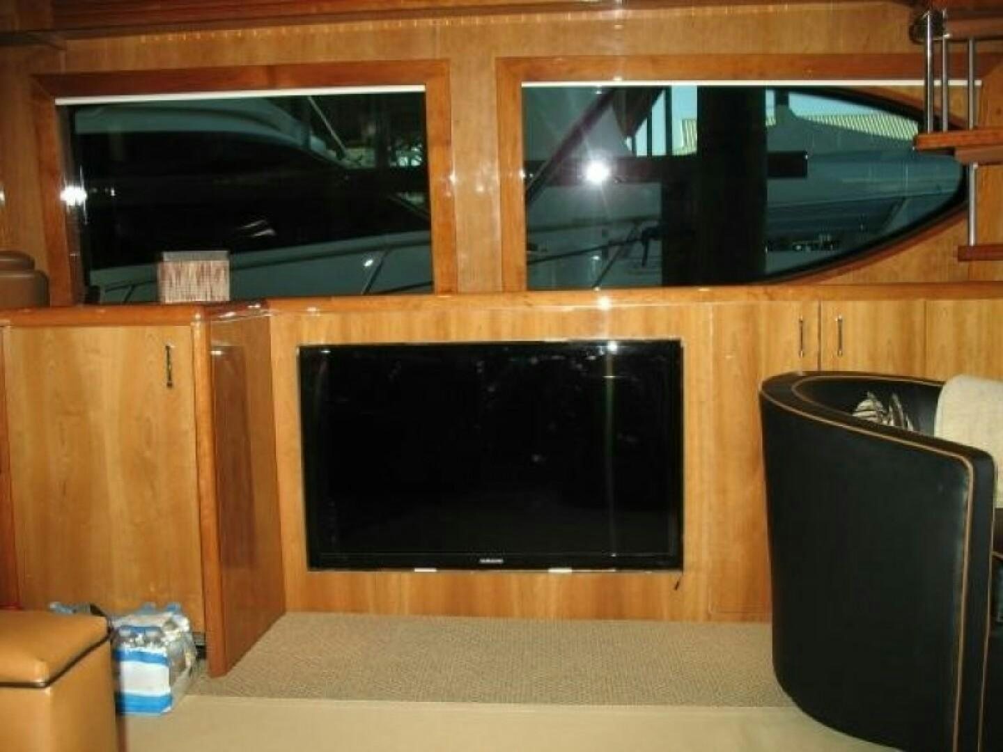 a tv on a cabinet aboard LIVNWEL Yacht for Sale