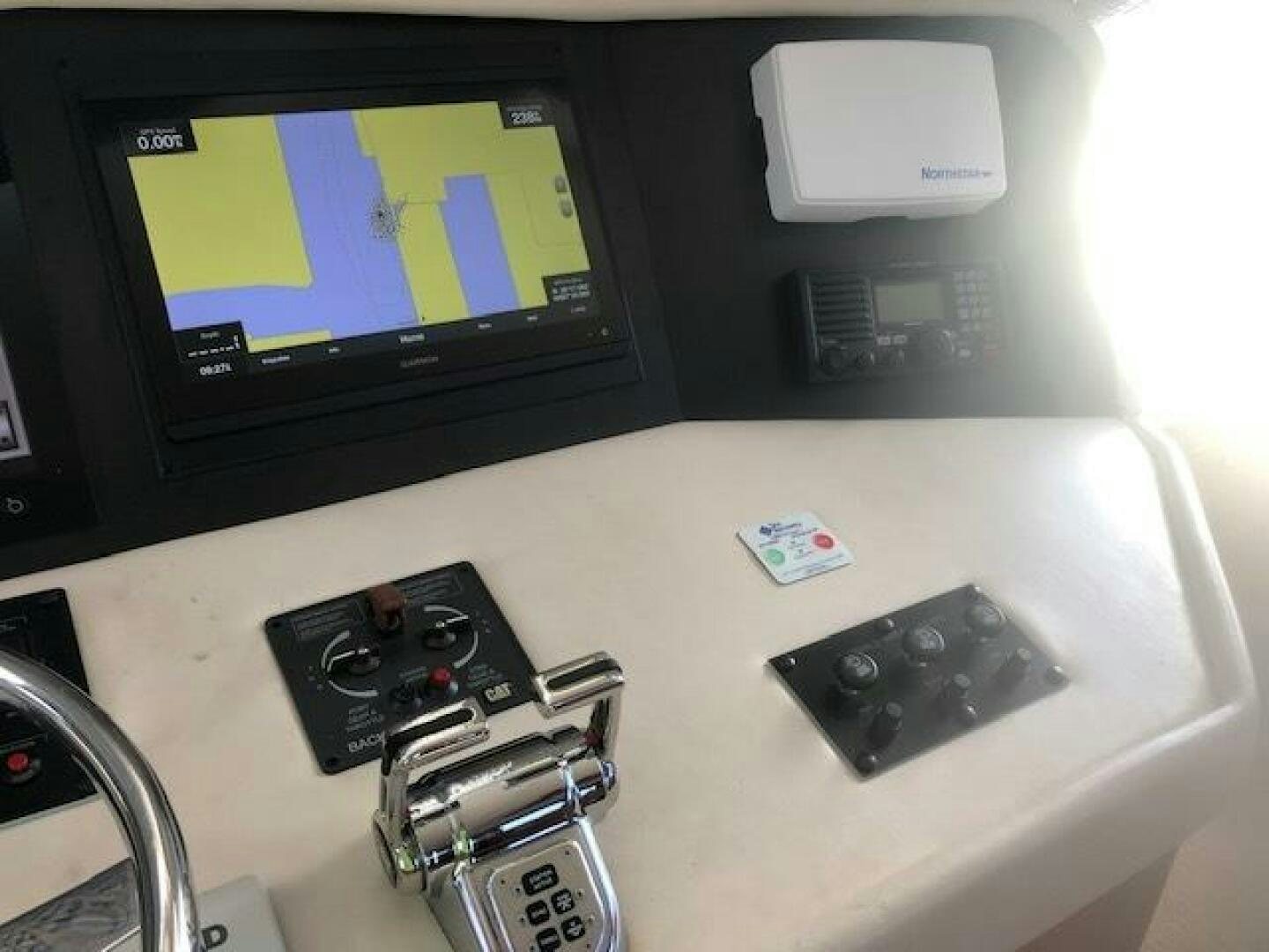 a computer with a green screen aboard LIVNWEL Yacht for Sale