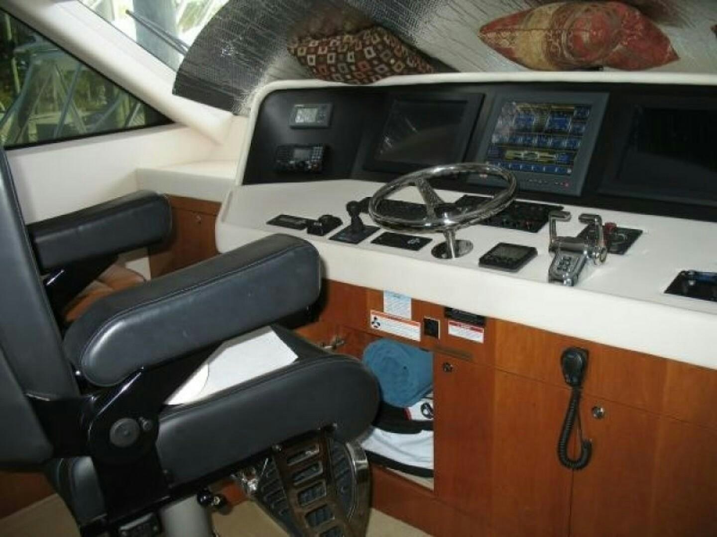 a car with a keyboard and a monitor aboard LIVNWEL Yacht for Sale