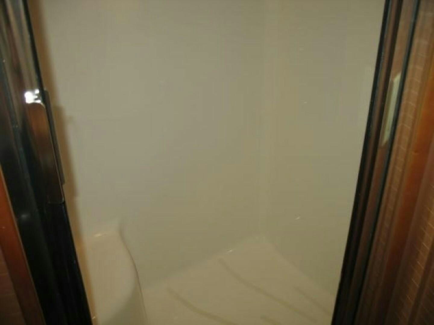a door with a handle aboard LIVNWEL Yacht for Sale