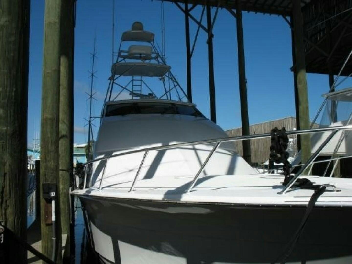a boat with a person sitting on it aboard LIVNWEL Yacht for Sale