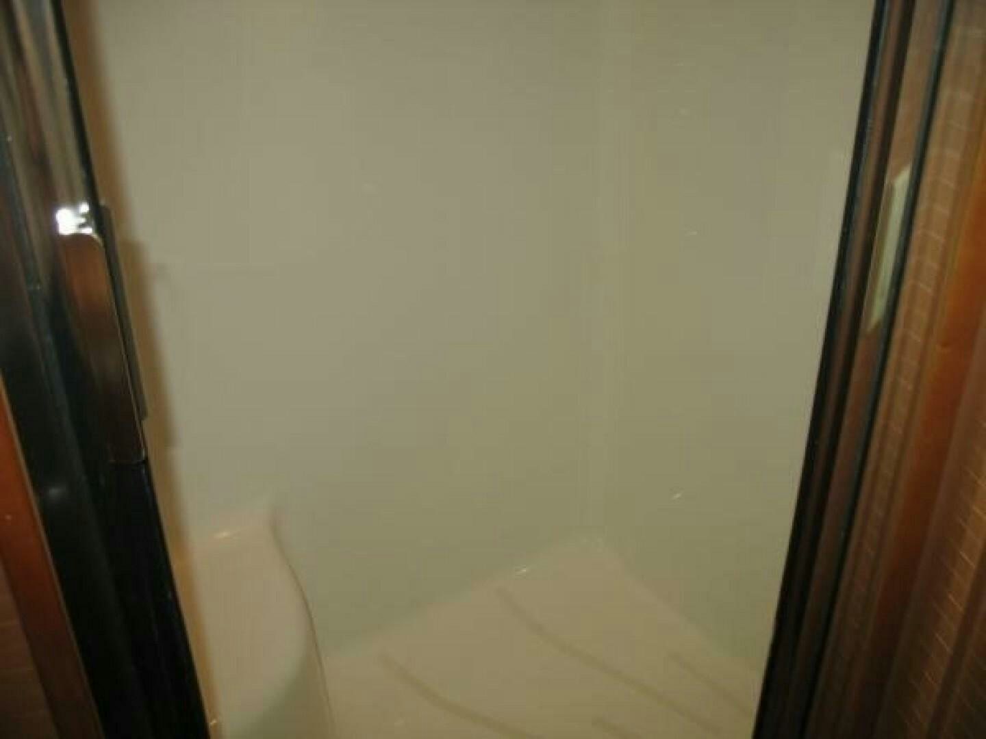 a door with a handle aboard LIVNWEL Yacht for Sale