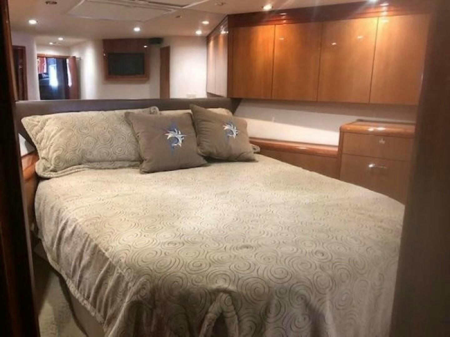a bed with pillows aboard LIVNWEL Yacht for Sale