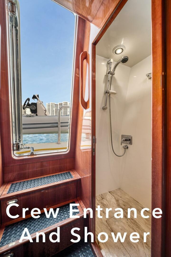 a bathroom with a window aboard ESCAPE Yacht for Sale