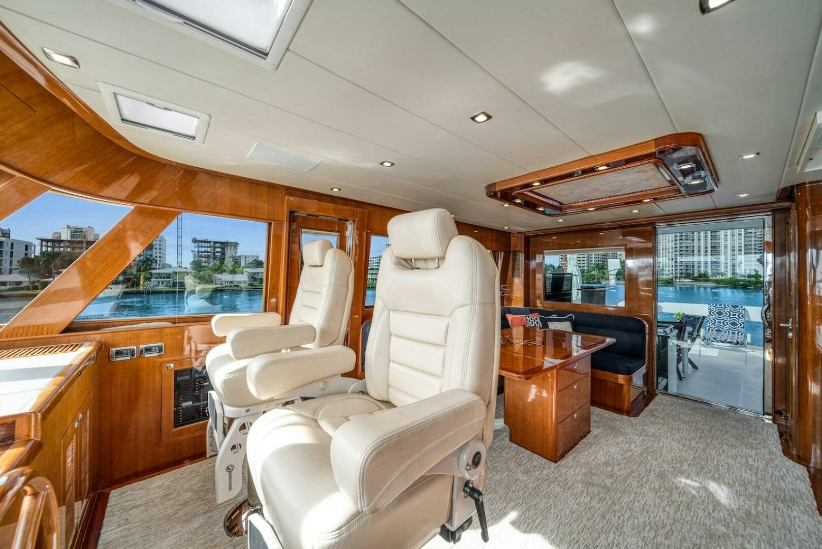 a room with a chair and a table aboard ESCAPE Yacht for Sale