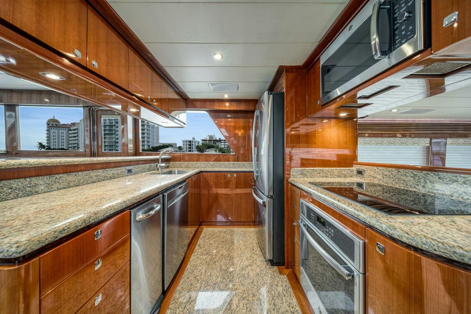 a kitchen with a large island aboard ESCAPE Yacht for Sale