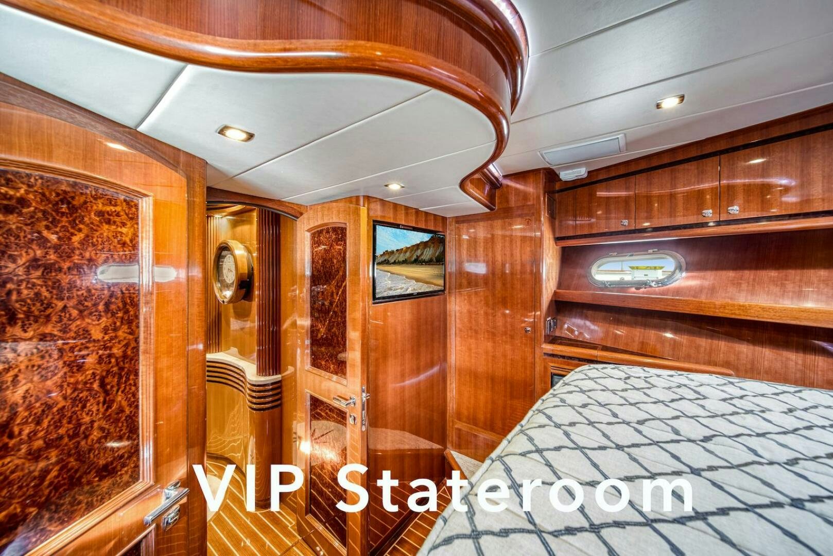 a room with wood cabinets aboard ESCAPE Yacht for Sale