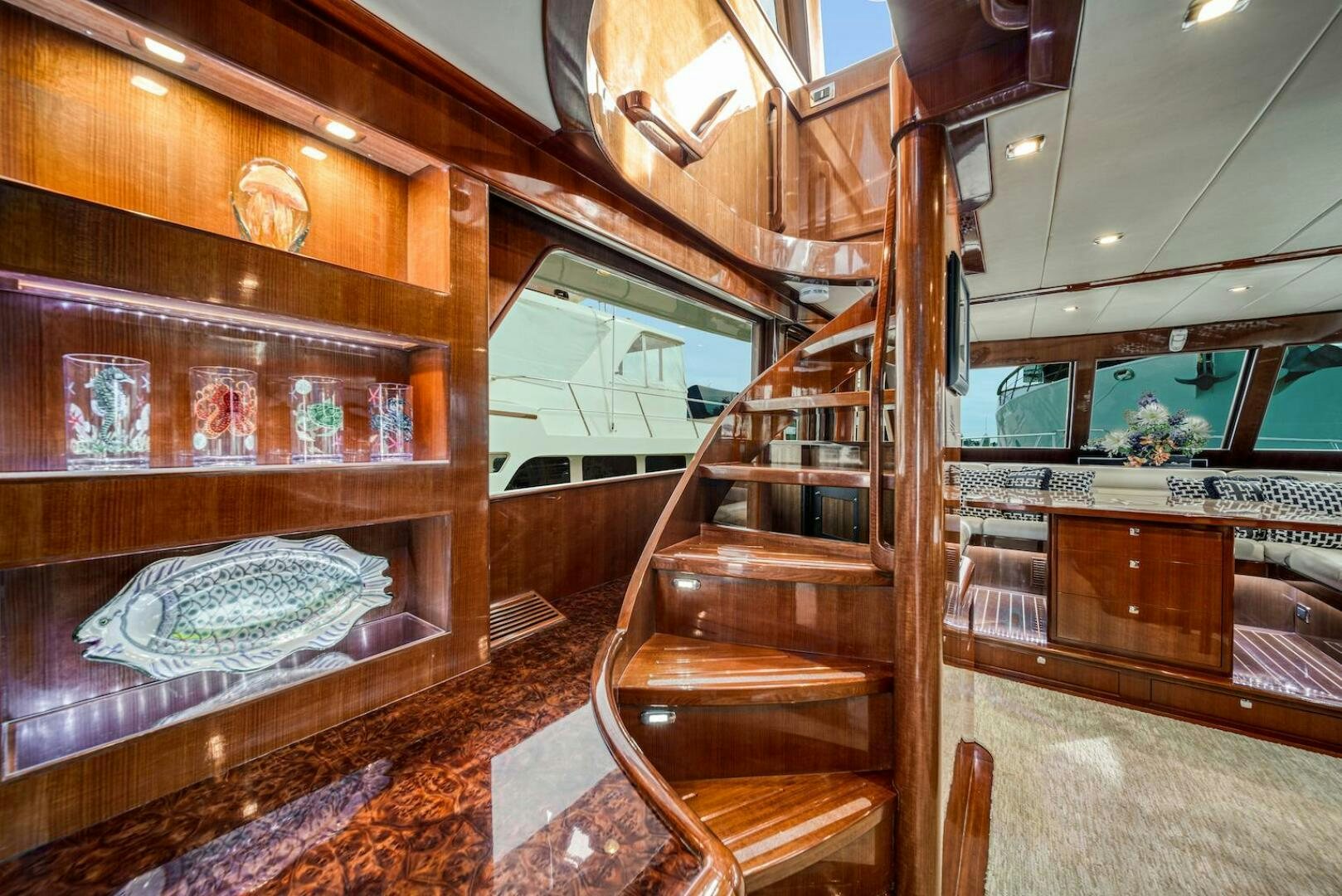 a wooden chair in a room aboard ESCAPE Yacht for Sale