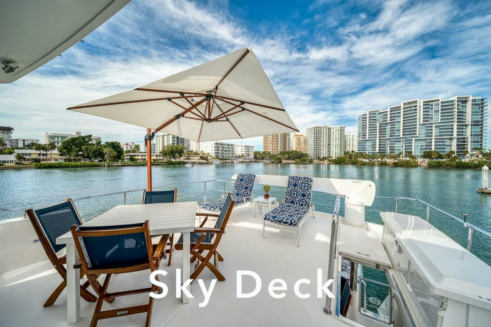 a table and chairs on a boat aboard ESCAPE Yacht for Sale