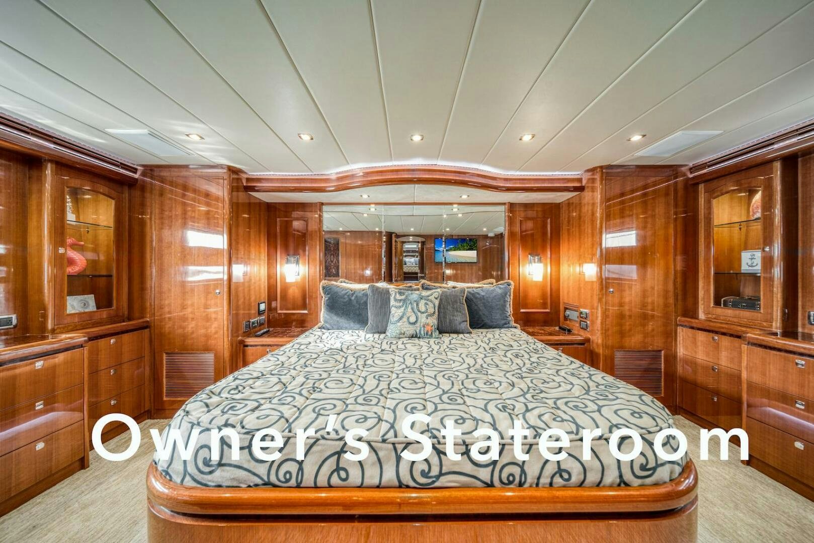 a large bed in a cabin aboard ESCAPE Yacht for Sale