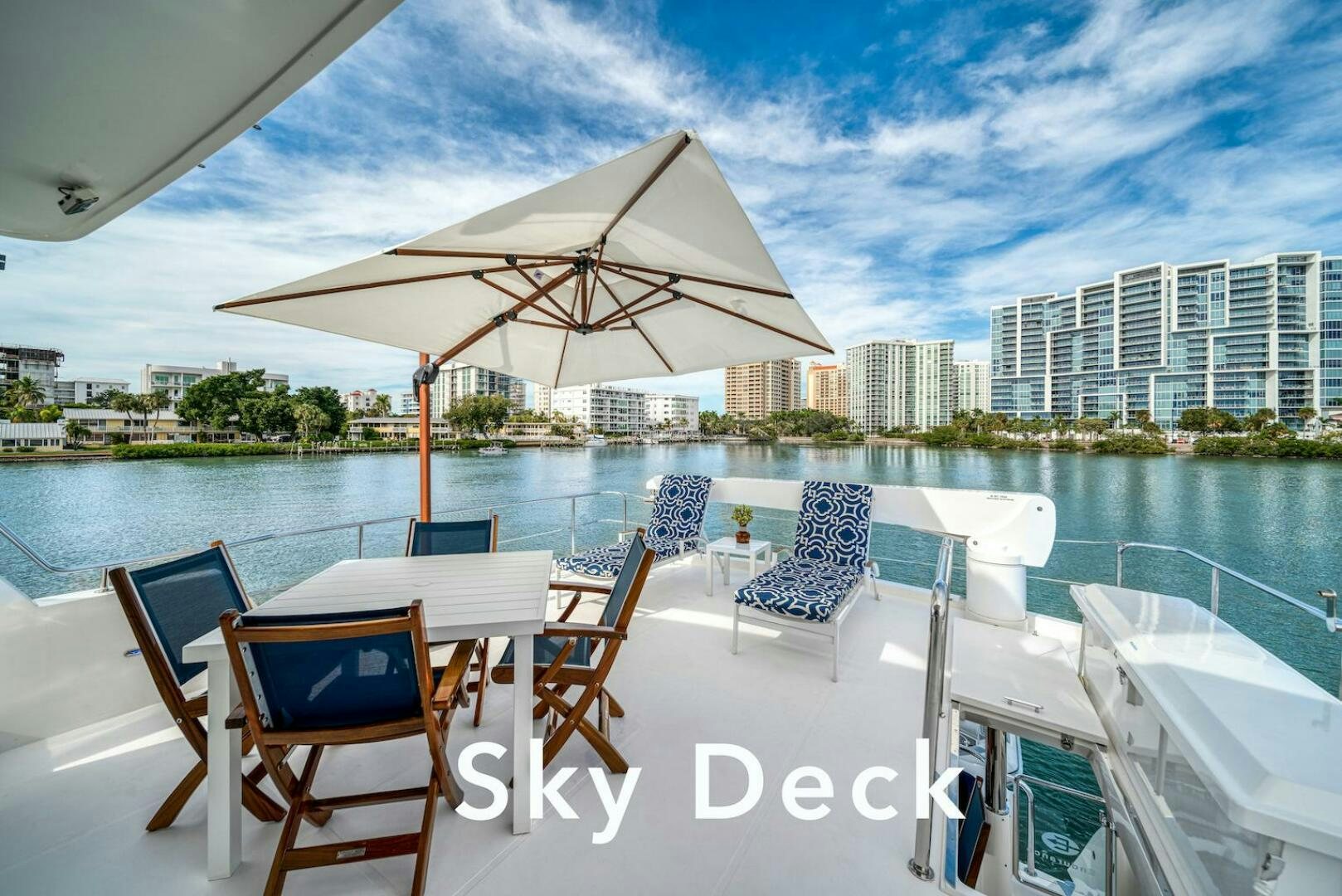 a table and chairs on a boat aboard ESCAPE Yacht for Sale