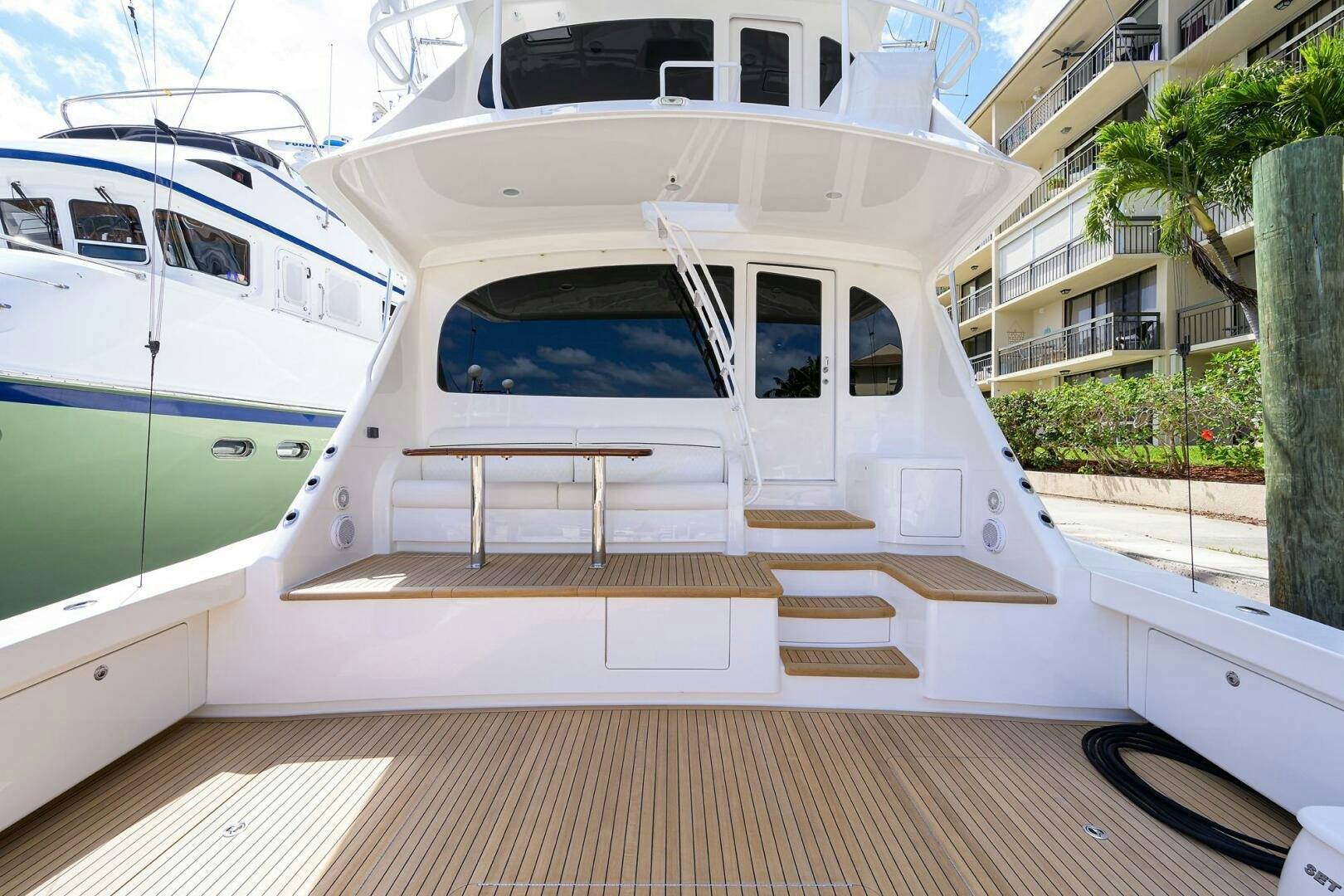 a white boat on a deck aboard 80' VIKING Yacht for Sale