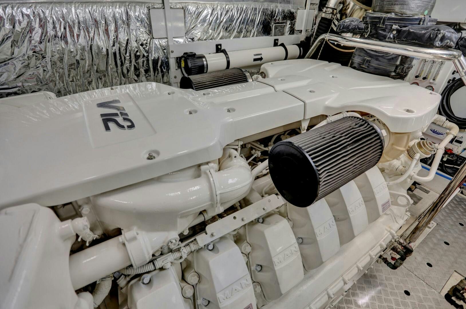 a white machine with a black cap aboard REAL SLICK Yacht for Sale