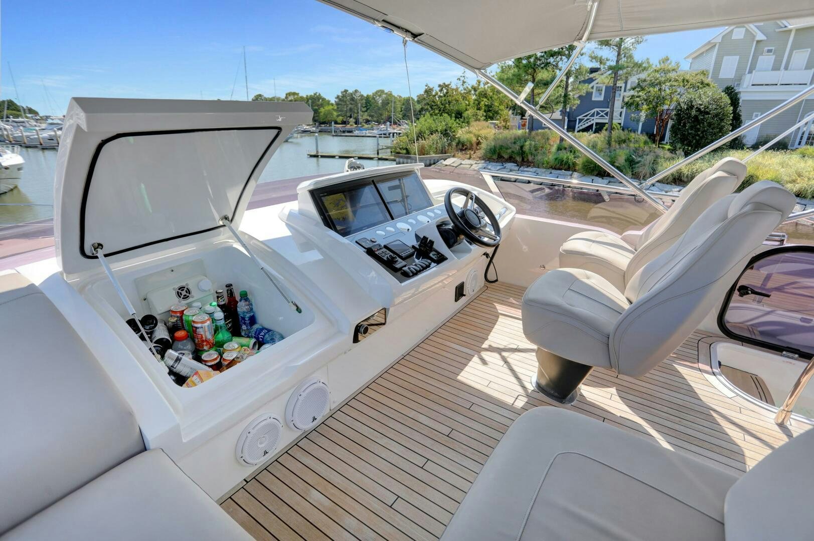 a car with bottles in the back aboard REAL SLICK Yacht for Sale