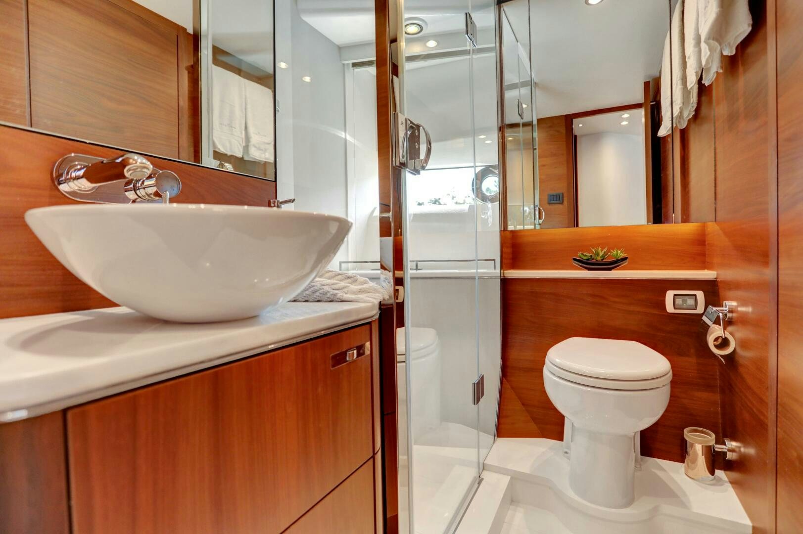 a bathroom with a sink toilet and a shower aboard REAL SLICK Yacht for Sale