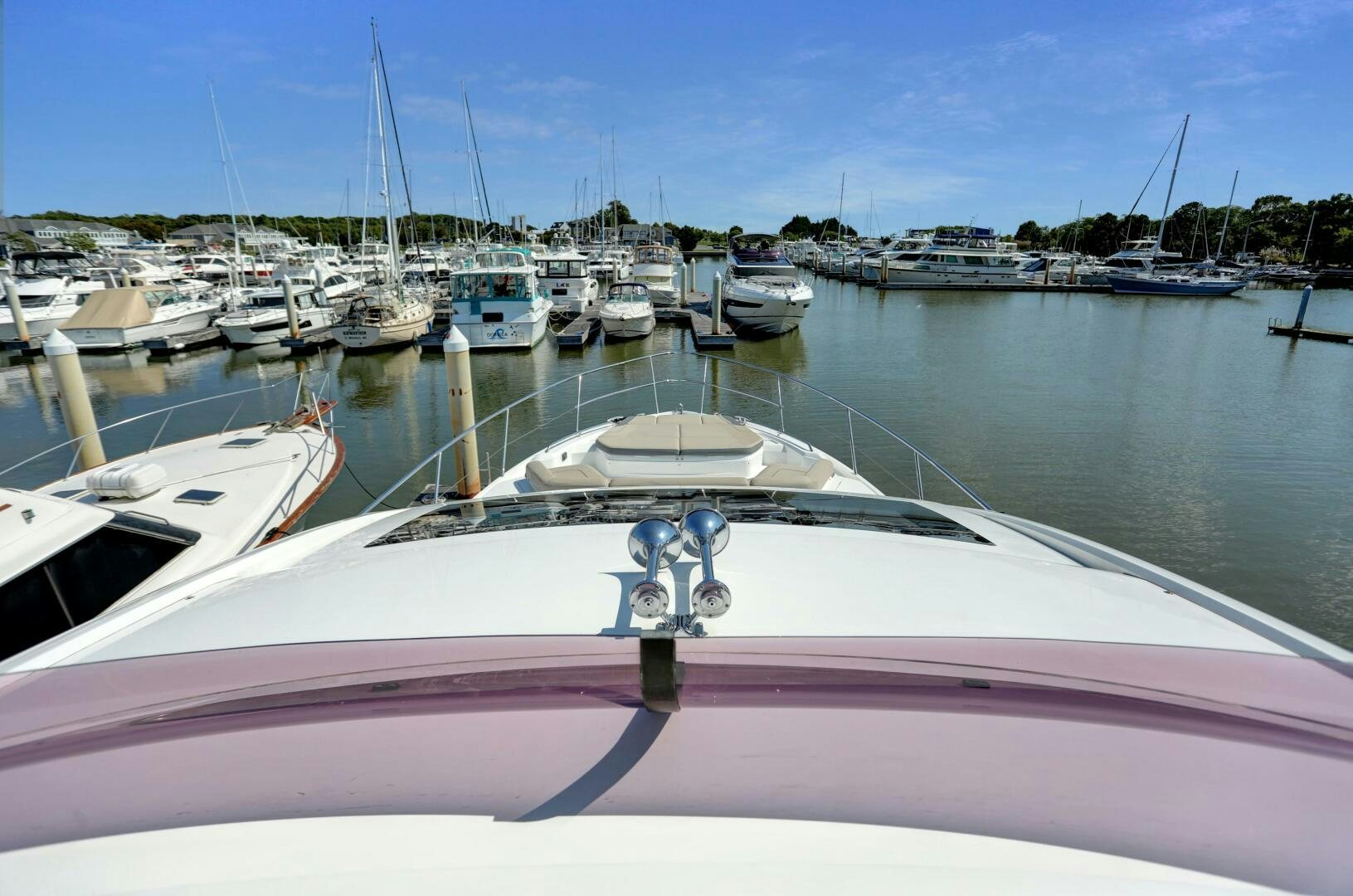 a boat in a harbor aboard REAL SLICK Yacht for Sale