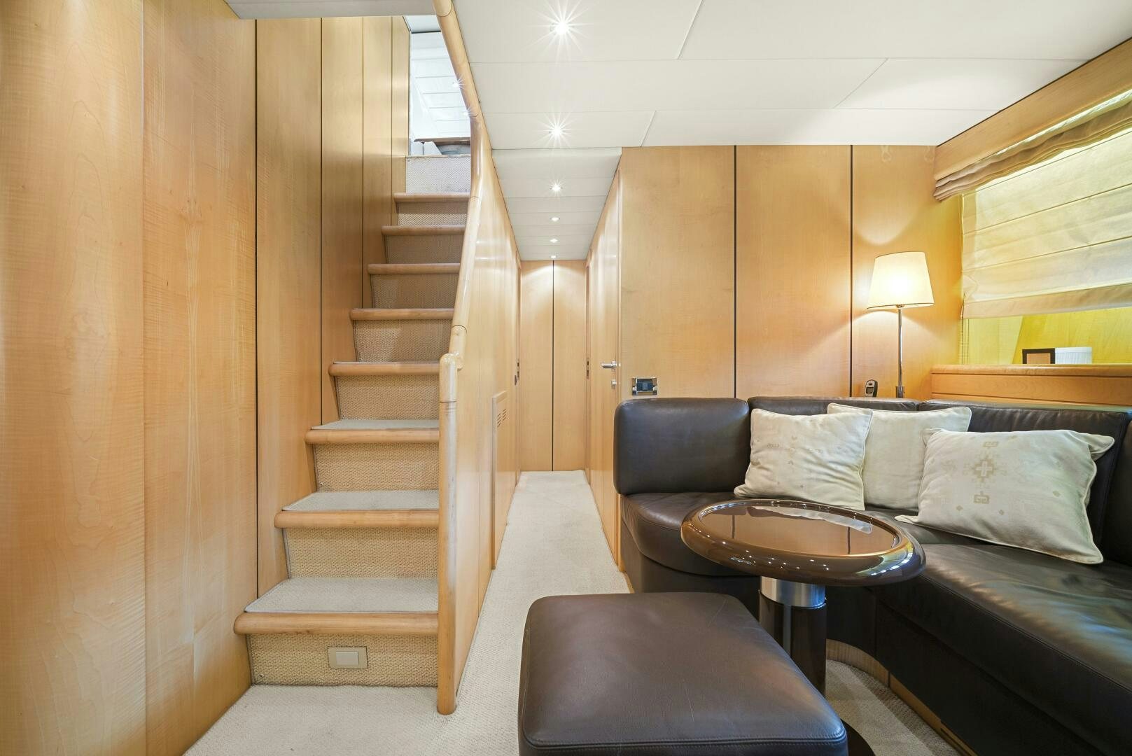 a living room with a staircase aboard NONE Yacht for Sale