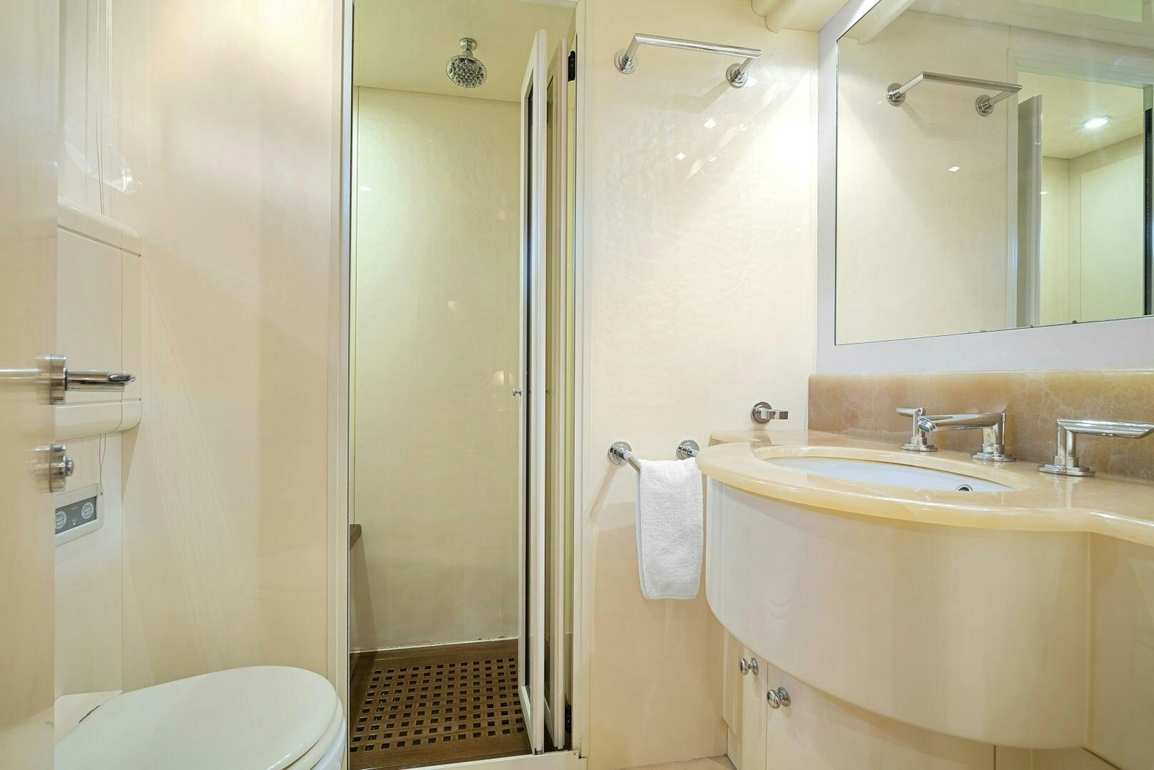 a bathroom with a shower sink and toilet aboard NONE Yacht for Sale