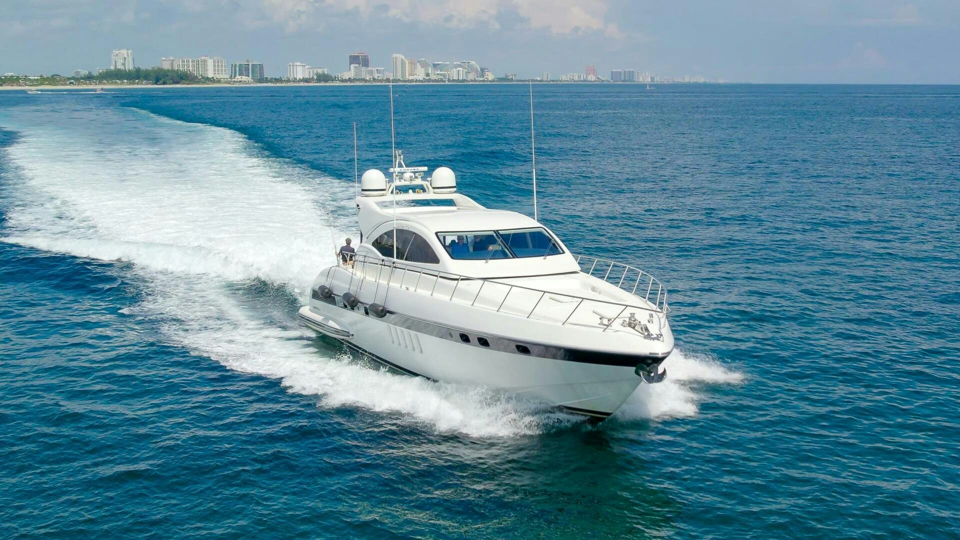 a white boat on the water aboard GABRIELA G Yacht for Sale