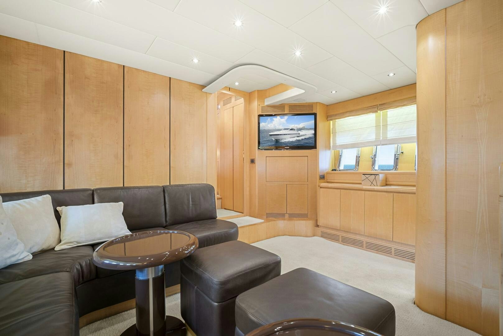 a living room with a couch and a tv aboard NONE Yacht for Sale