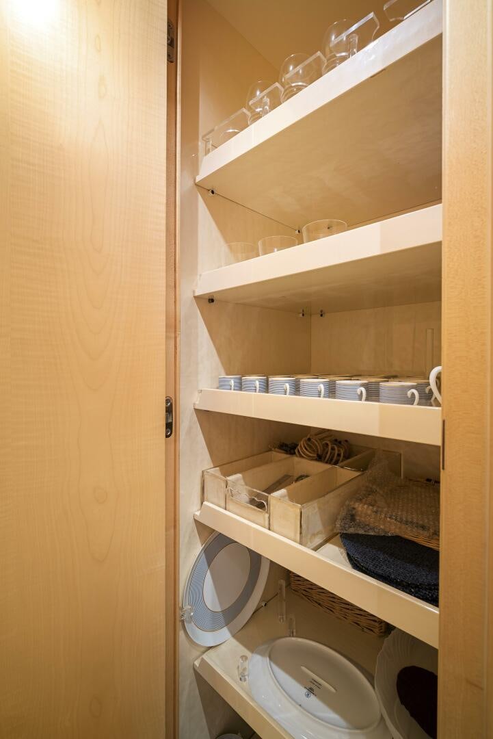 a cupboard with a sink and shelves aboard NONE Yacht for Sale