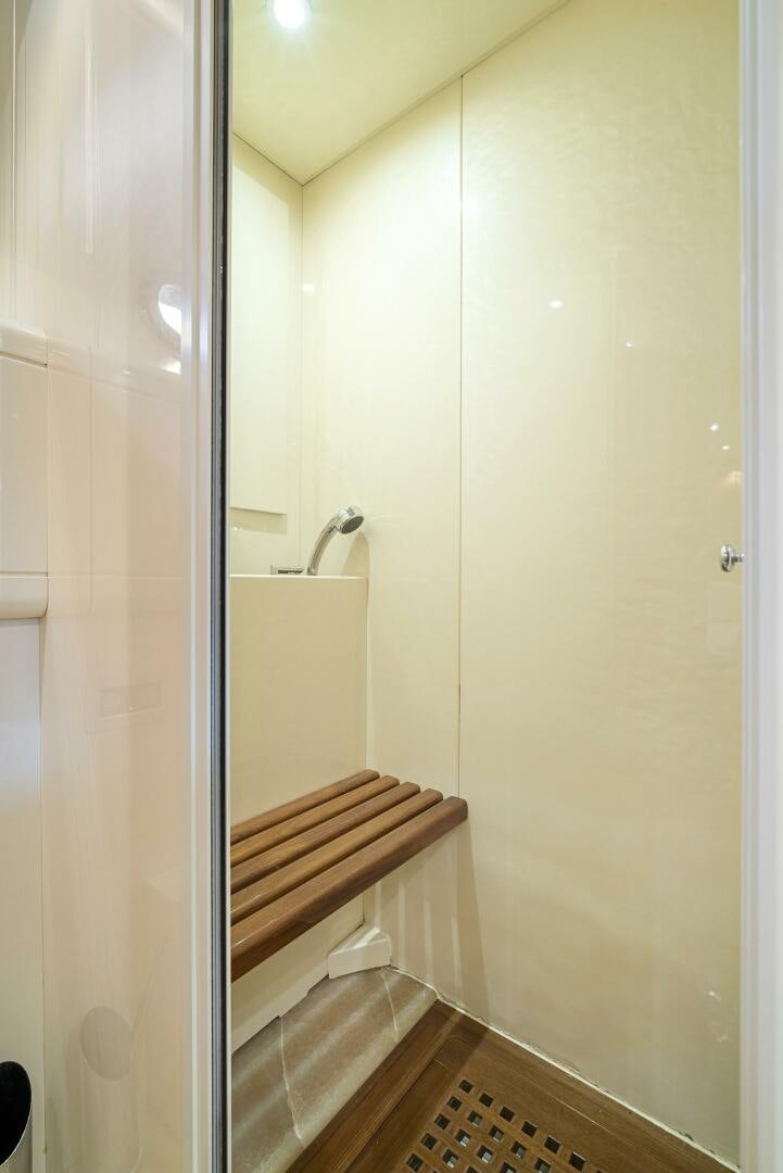 a bathroom with a wooden shelf aboard NONE Yacht for Sale