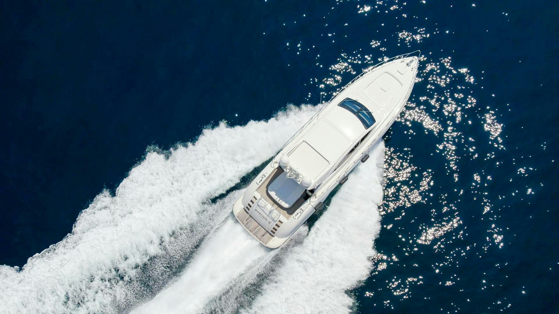 a space shuttle flying over the earth aboard NONE Yacht for Sale